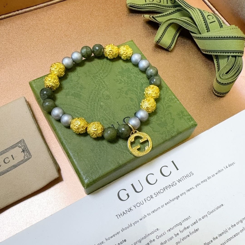 G*u*i bracelets